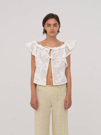 Top bianco Lux con volant e ricami