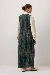 Abito lungo smanicato in tweed con scollo a V