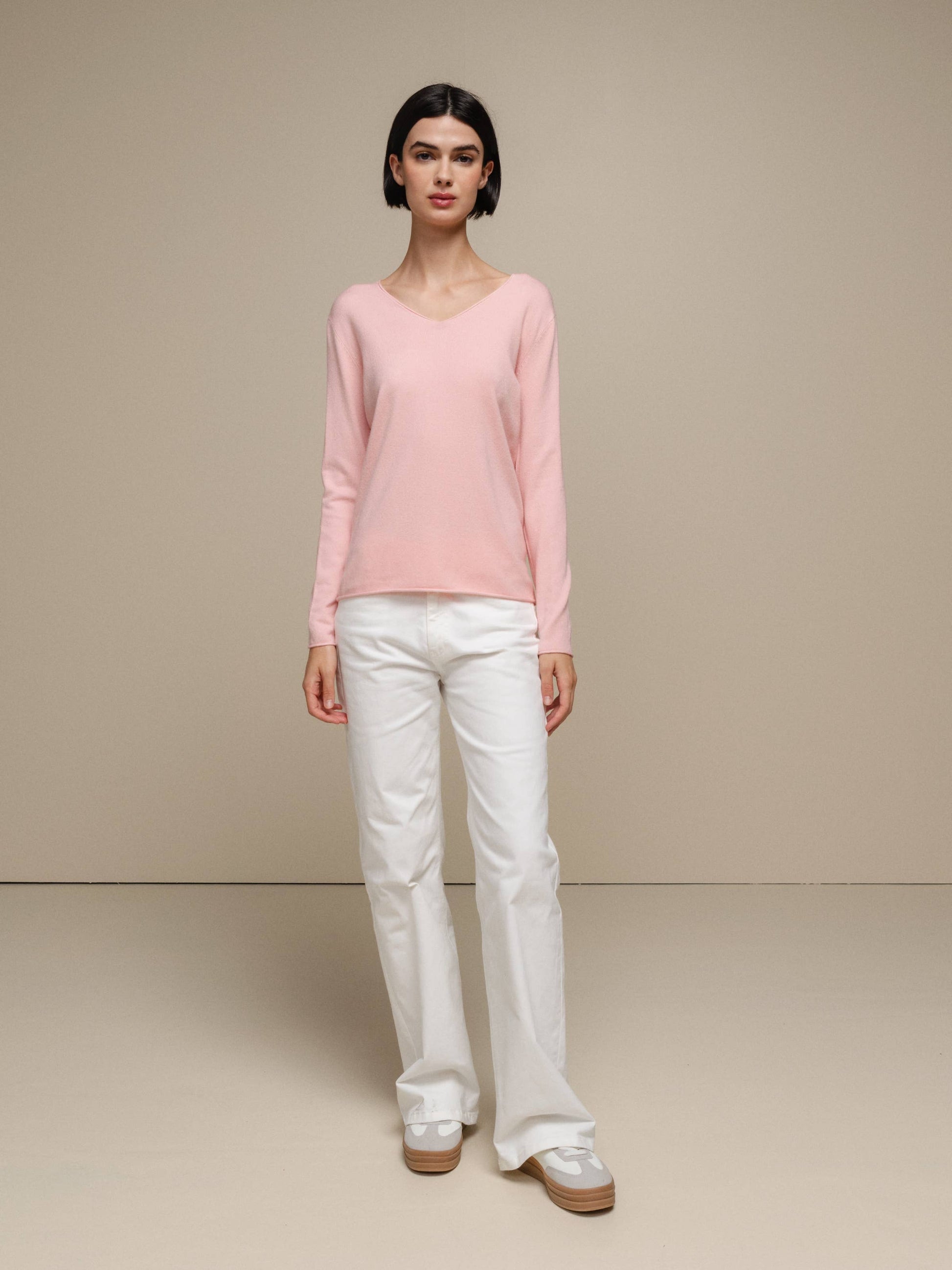 Maglione in maglia da donna con scollo a V