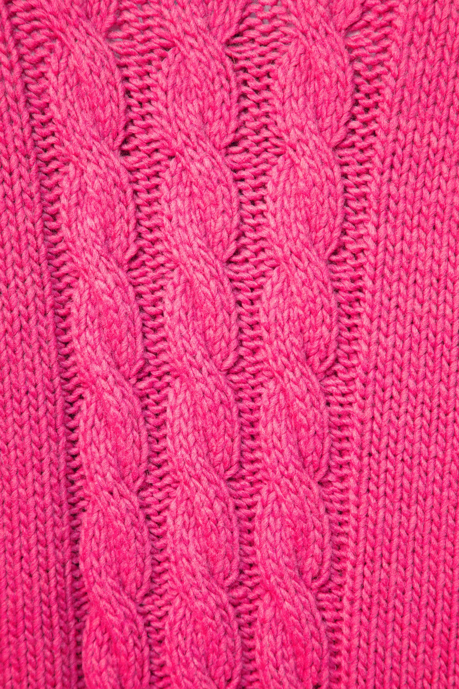 Maglione in maglia a trecce fucsia