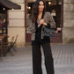Cardigan animalier in maglia con bordi neri