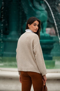 Cardigan in maglia beige con bottoni