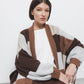 Cardigan in maglia color block con motivo geometrico
