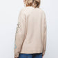 Cappotto cardigan in maglia con ricamo floreale