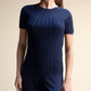 Top in maglia a trecce a maniche corte