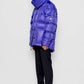 Piumino oversize viola con cappuccio removibile