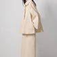 Trench corto in gabardine di cotone con maniche svasate