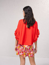 Blusa fluida con maniche a volant plissé