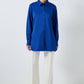 Camicia lunga indaco con orlo a balze