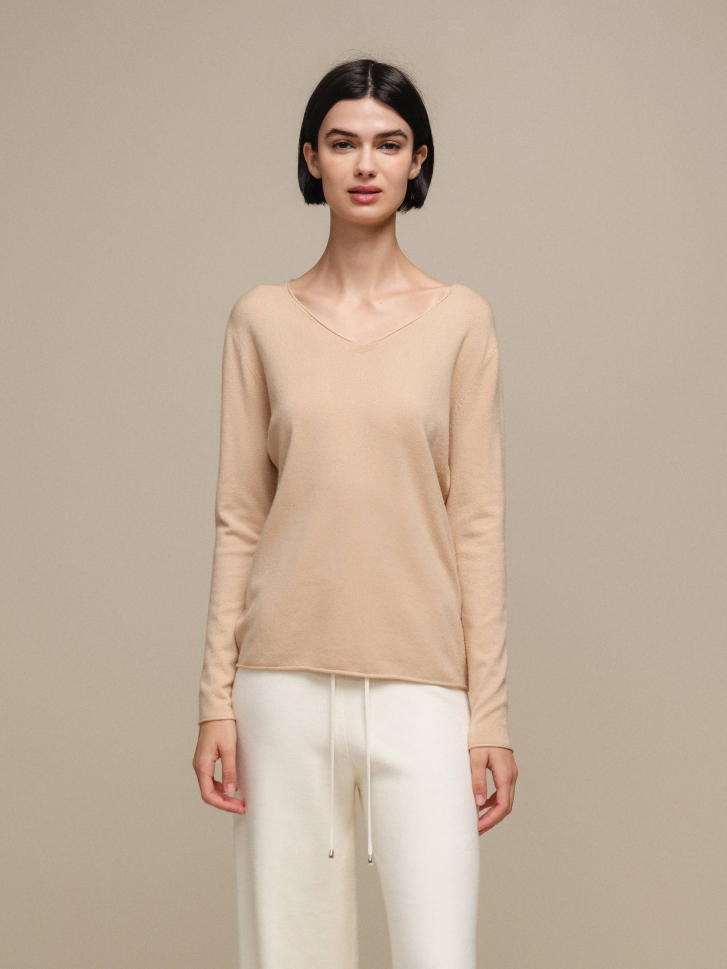 Maglione in maglia da donna con scollo a V