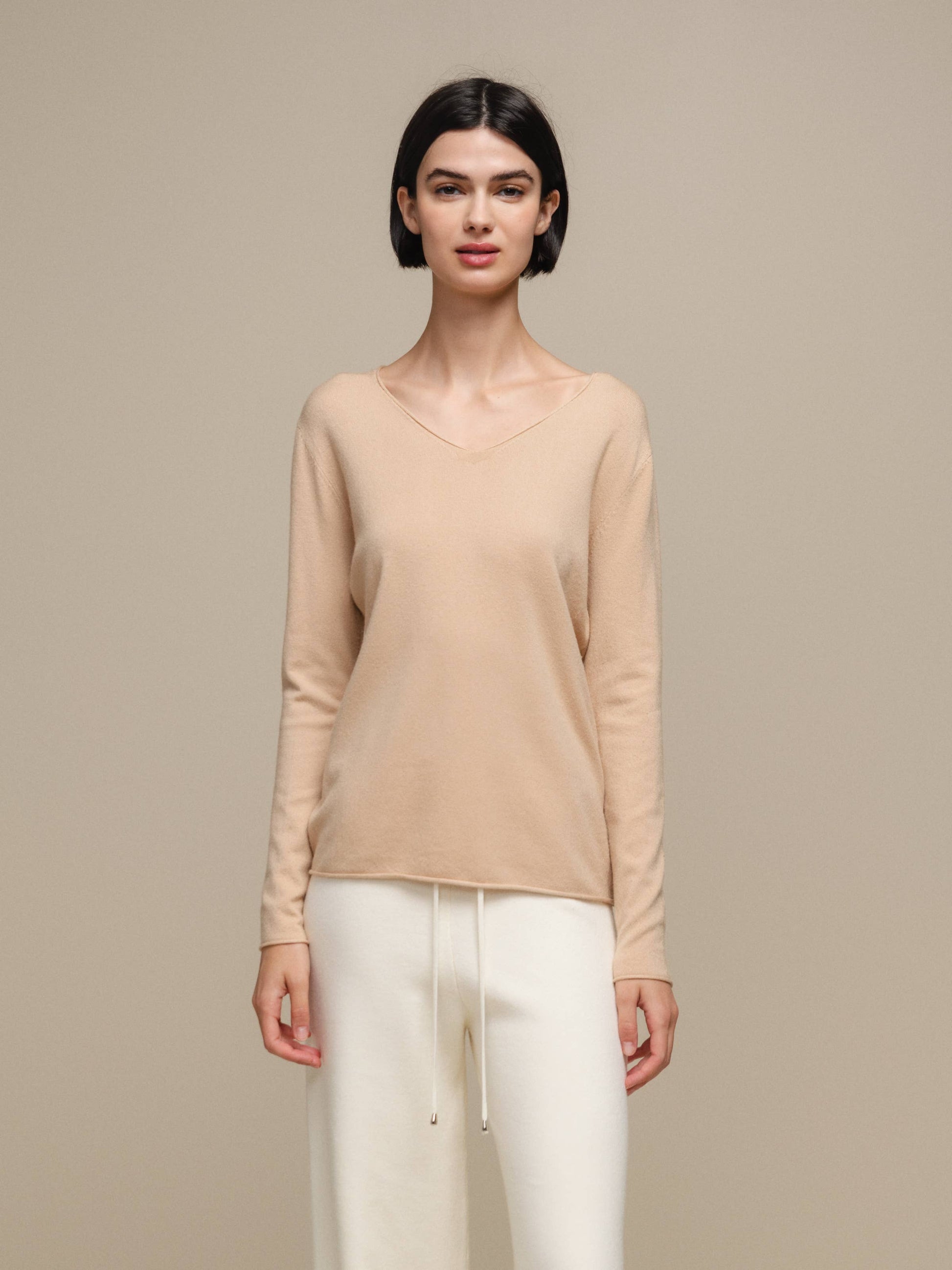 Maglione in maglia da donna con scollo a V