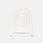 Maglione in maglia rasata con scollo a V e fiocco