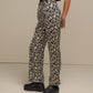 Pantaloni a fantasia geometriche effetto perlato