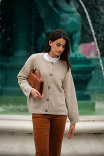 Cardigan in maglia beige con bottoni