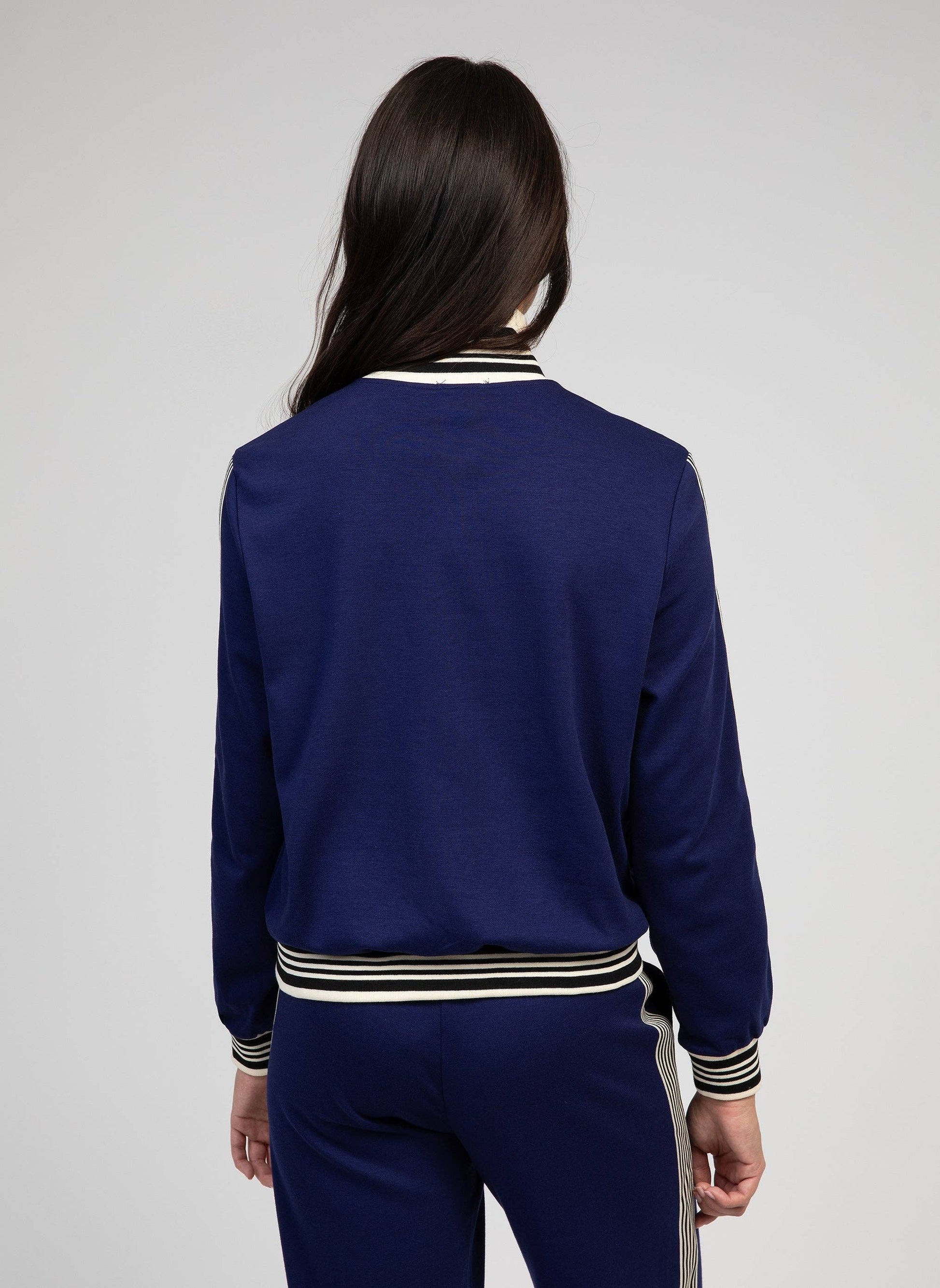 Giacca sportiva Halbator blu con collo alto e zip