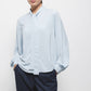Blusa tinta unita con fiocco al collo