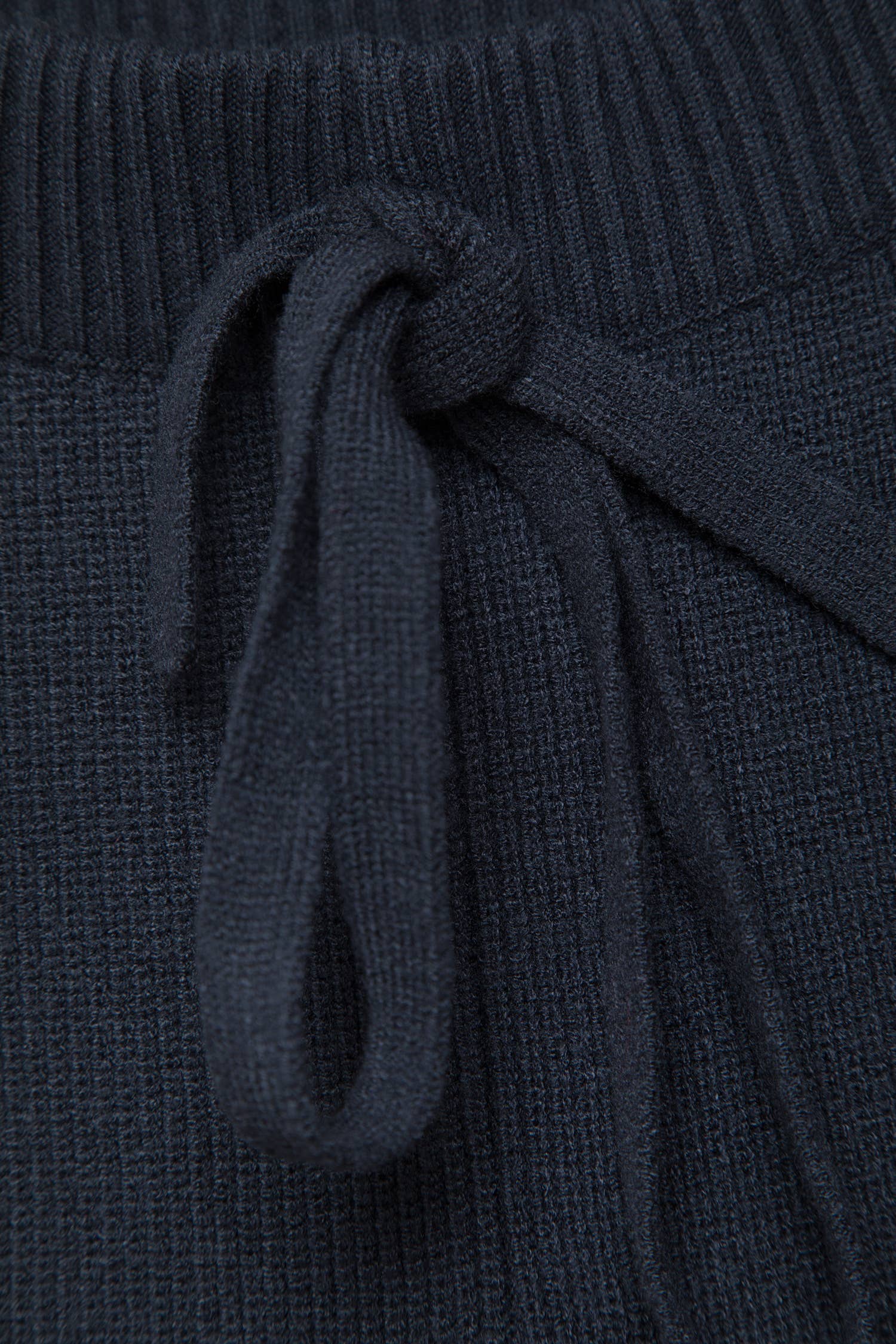 Pantaloni palazzo in maglia con vita elasticizzata