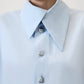 Camicia oversize azzurra con bottoni in metallo