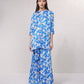 Blusa lunga in satin stampato blu