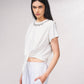 T-shirt crop con fiocco e applicazioni gioiello
