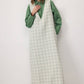Abito lungo smanicato in tweed