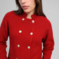 Cardigan in maglia rossa con bottoni dorati e collo alto
