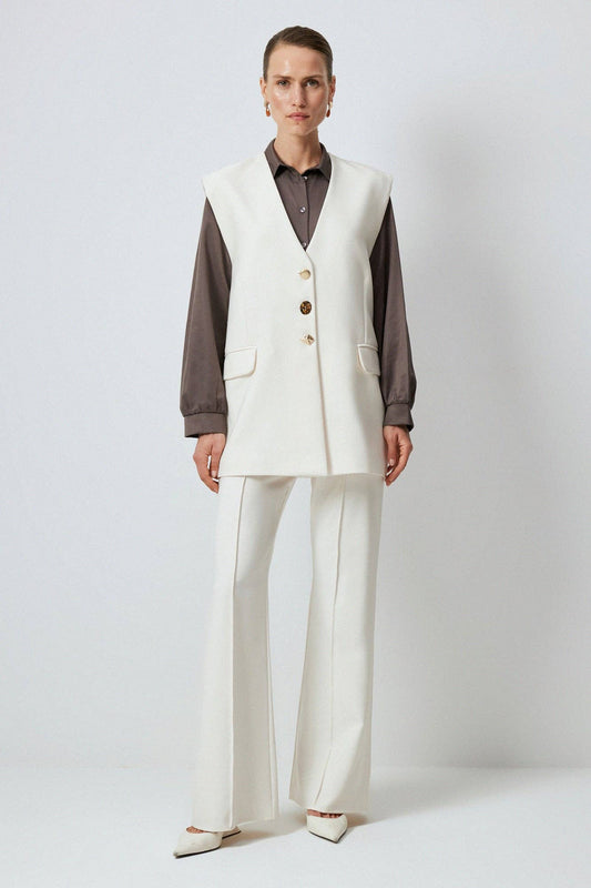 Gilet in crêpe con bottoni