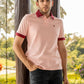 Polo antimacchia rosa con collo a contrasto