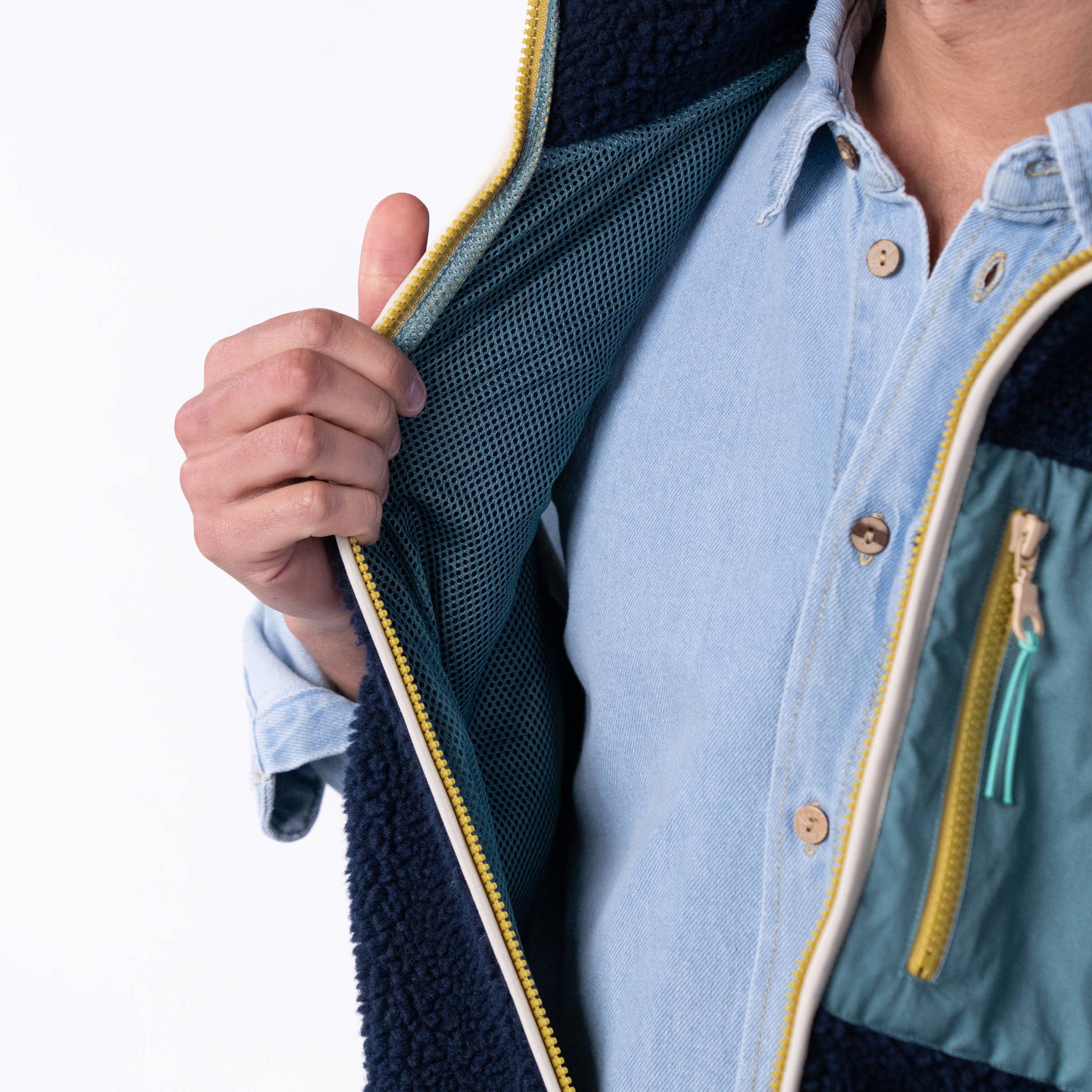 Gilet sherpa unisex con zip bicolor blu navy e verde