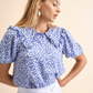 Blusa floreale in viscosa con volant