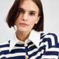 Cardigan lungo a righe con bottoni dorati
