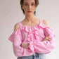 Blusa corta off-shoulder con volant e bottoni