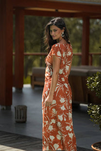 Abito midi terracotta con stampa floreale