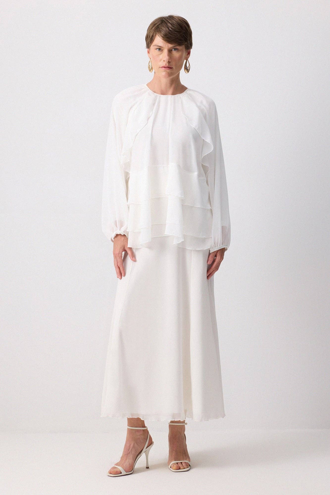 Blusa in chiffon a balze stratificate elegante