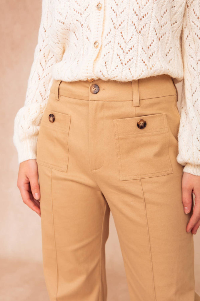 Pantaloni in cotone a vita alta con tasche applicate