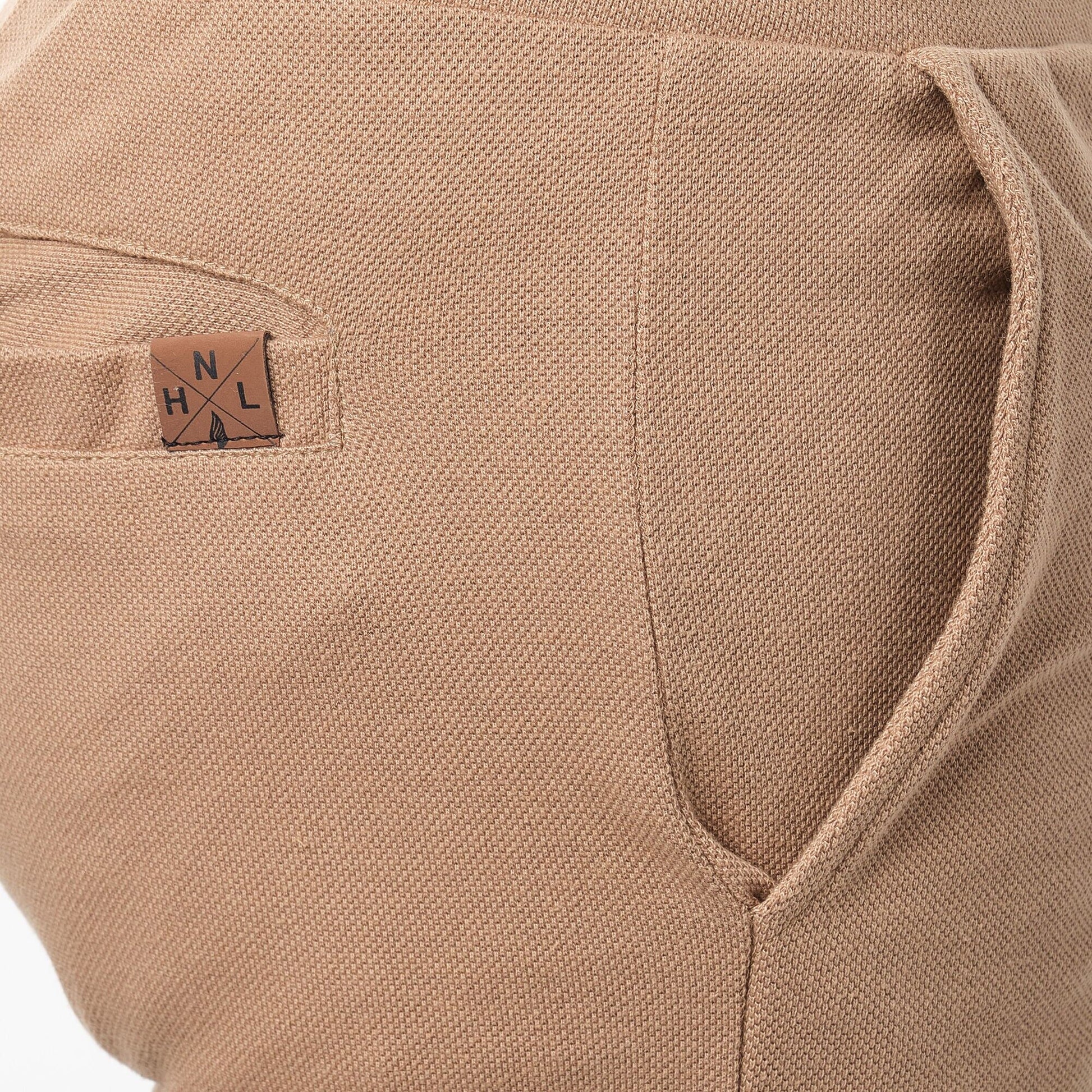 Bermuda in pile piqué beige da uomo