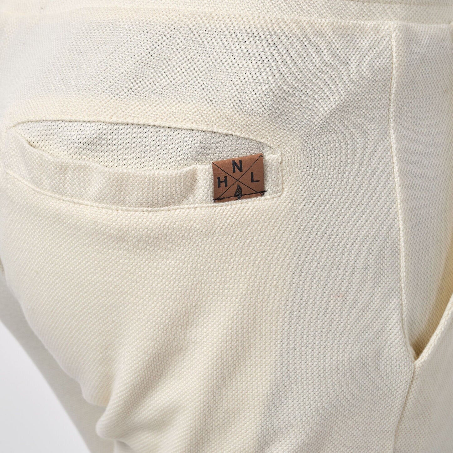 Pantaloncini bermuda in piqué ecrù da uomo