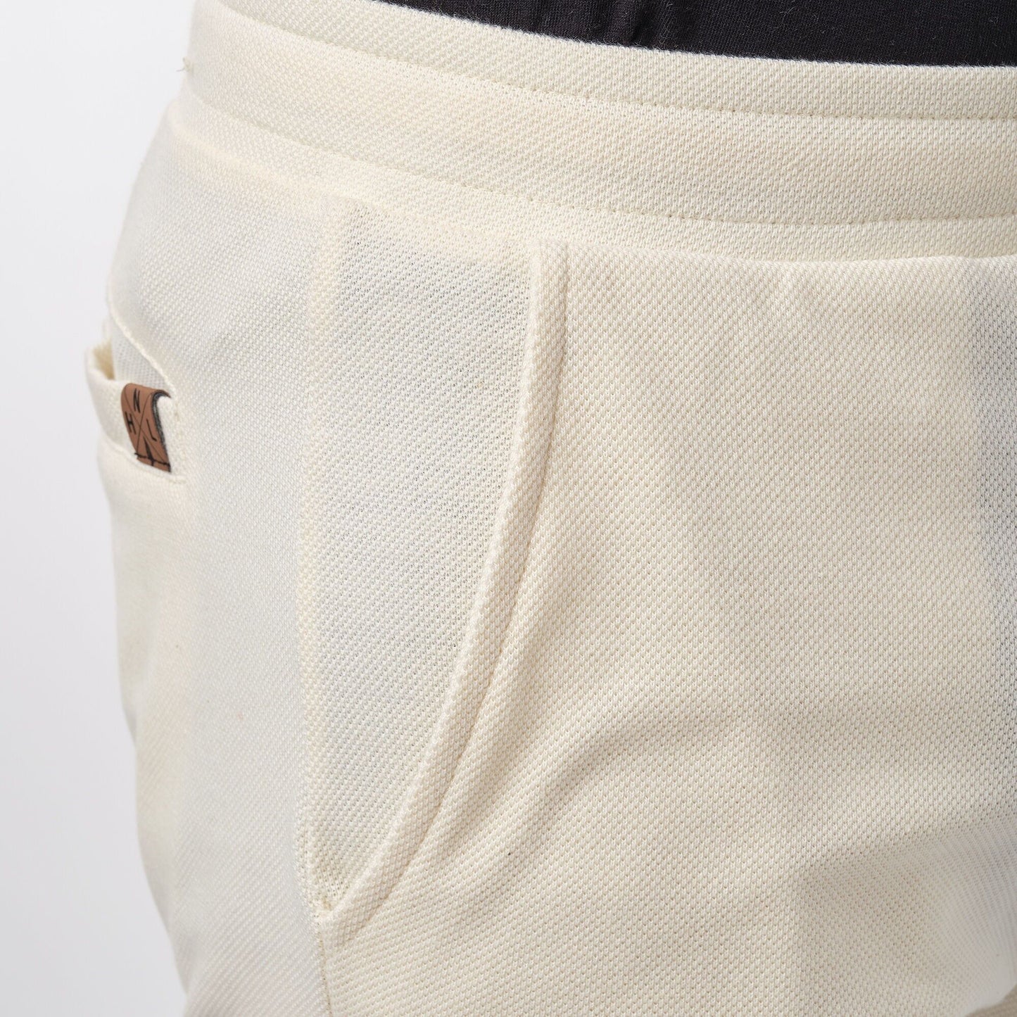 Pantaloncini bermuda in piqué ecrù da uomo
