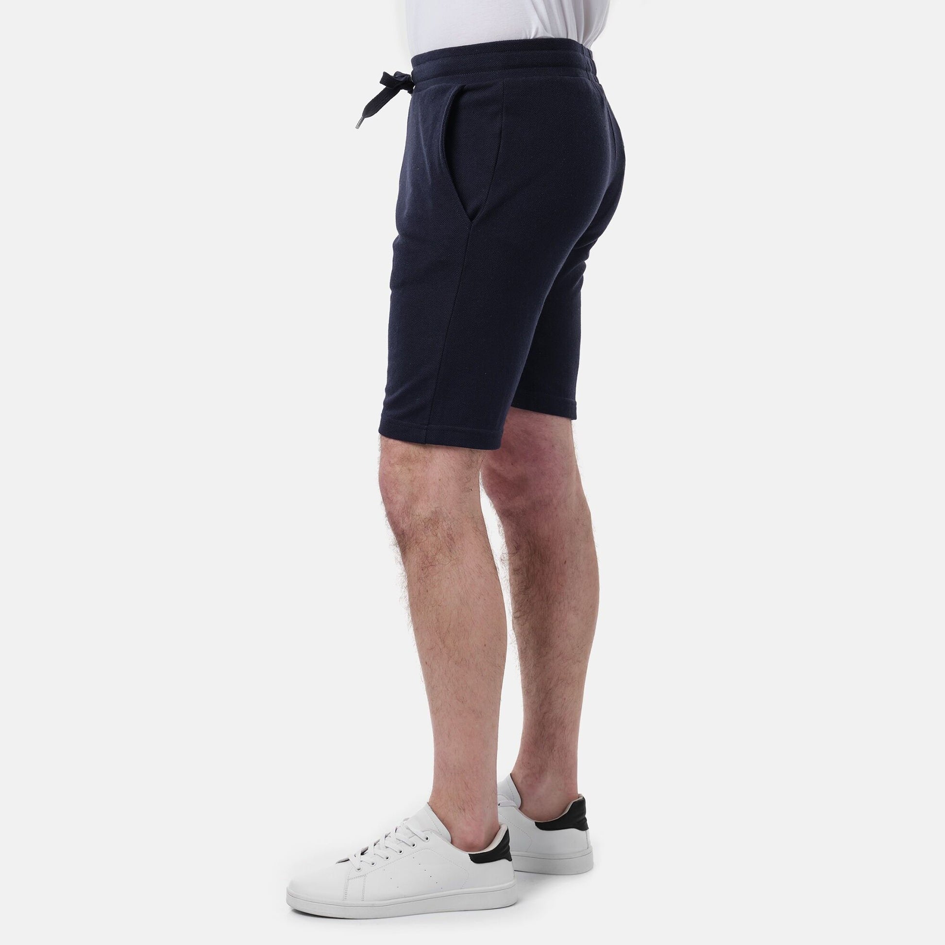 Bermuda uomo in felpa piqué tinta unita blu navy