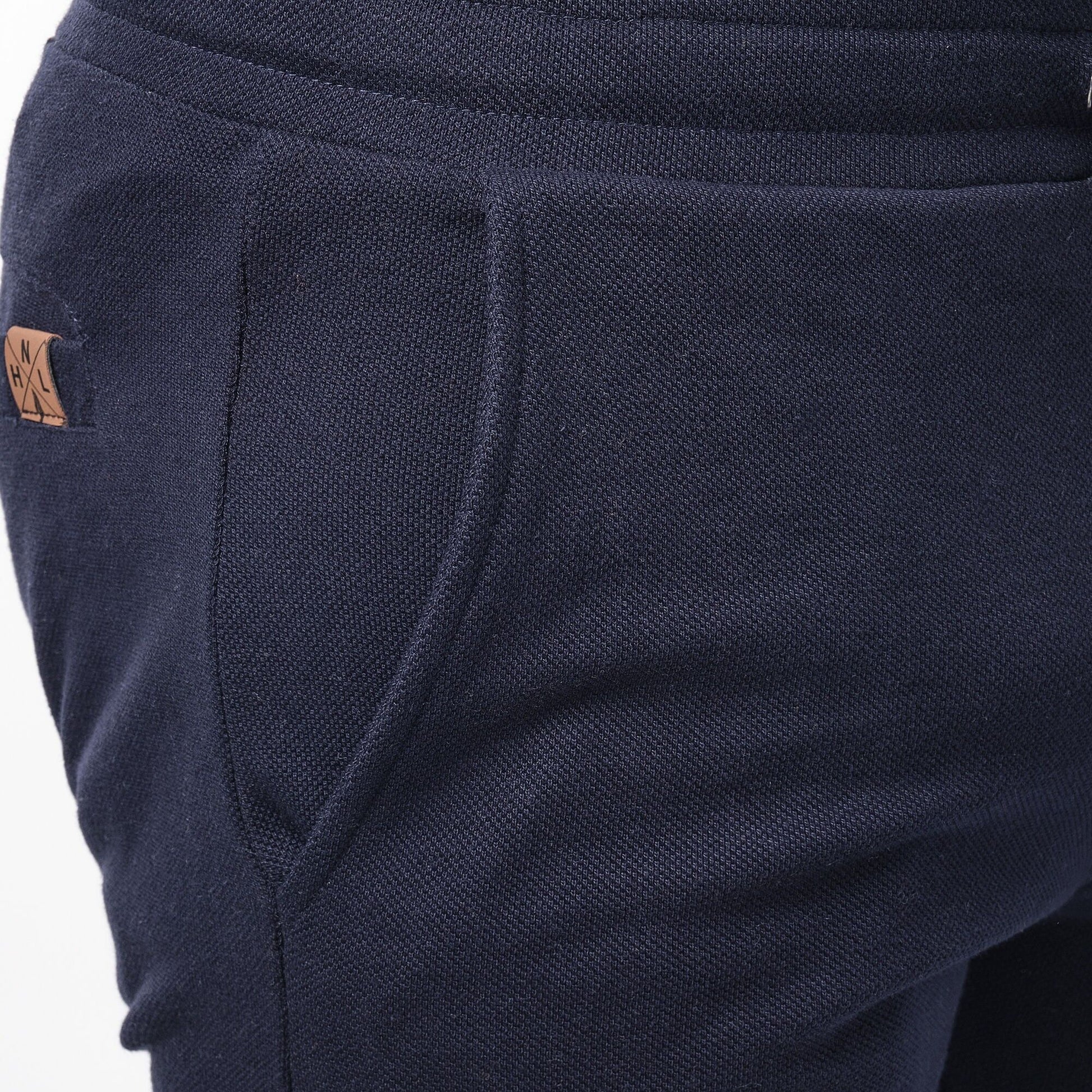 Bermuda uomo in felpa piqué tinta unita blu navy