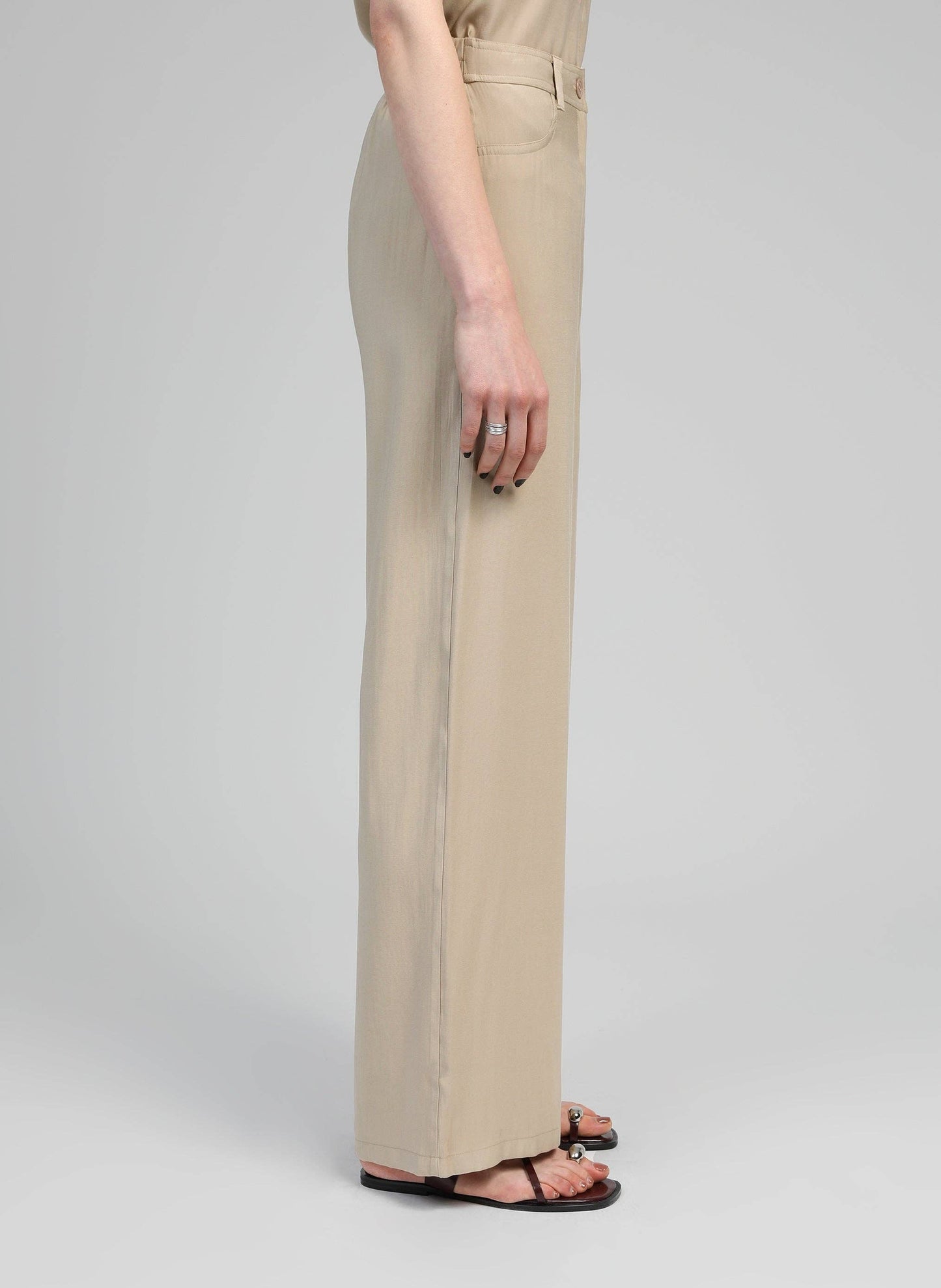 Pantaloni a zampa beige a vita alta