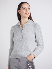 Polo in maglia con maniche a treccia