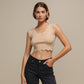 Top crop in maglia a costine con bordo ondulato