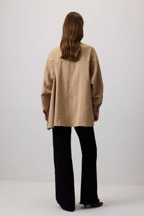 Camicia oversize abbottonata in effetto cupro