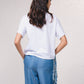 T-shirt oversize corta con stampa e fiocco laterale