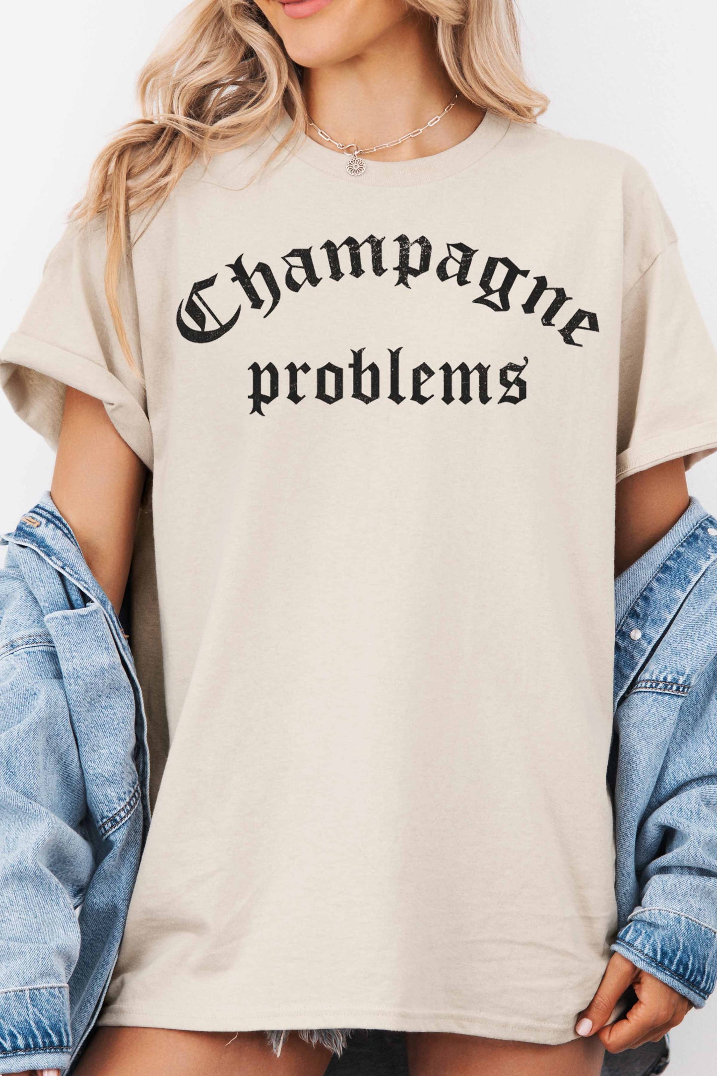 T-shirt oversize grafica “Champagne Problems”