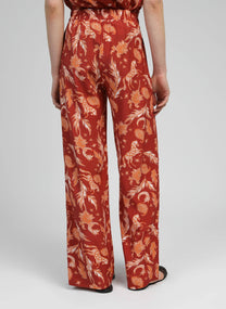 Pantaloni a vita alta terracotta con stampa frecce