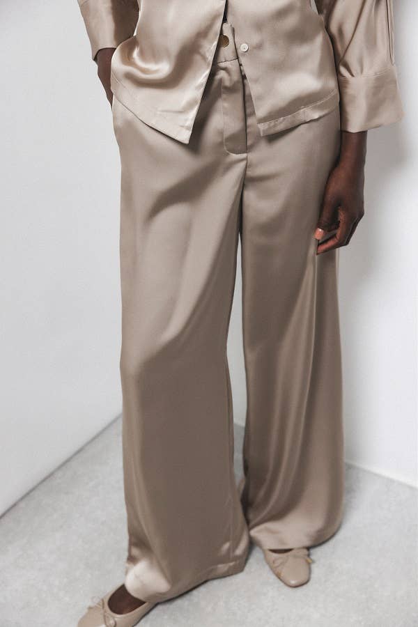 Pantaloni palazzo a gamba larga con tasche