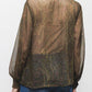 Blusa semitrasparente stampata con laccio al collo