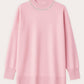 Maglione rosa con collo decorato in perle